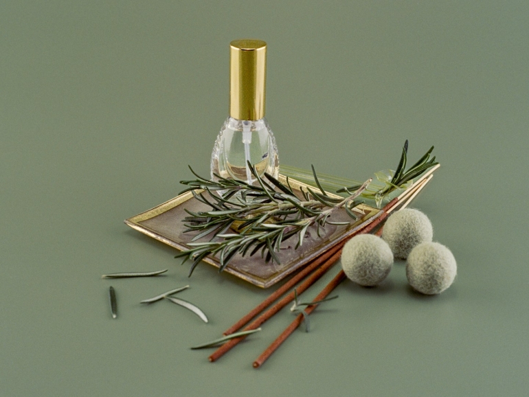 a bottle of perfume sitting on top of a table